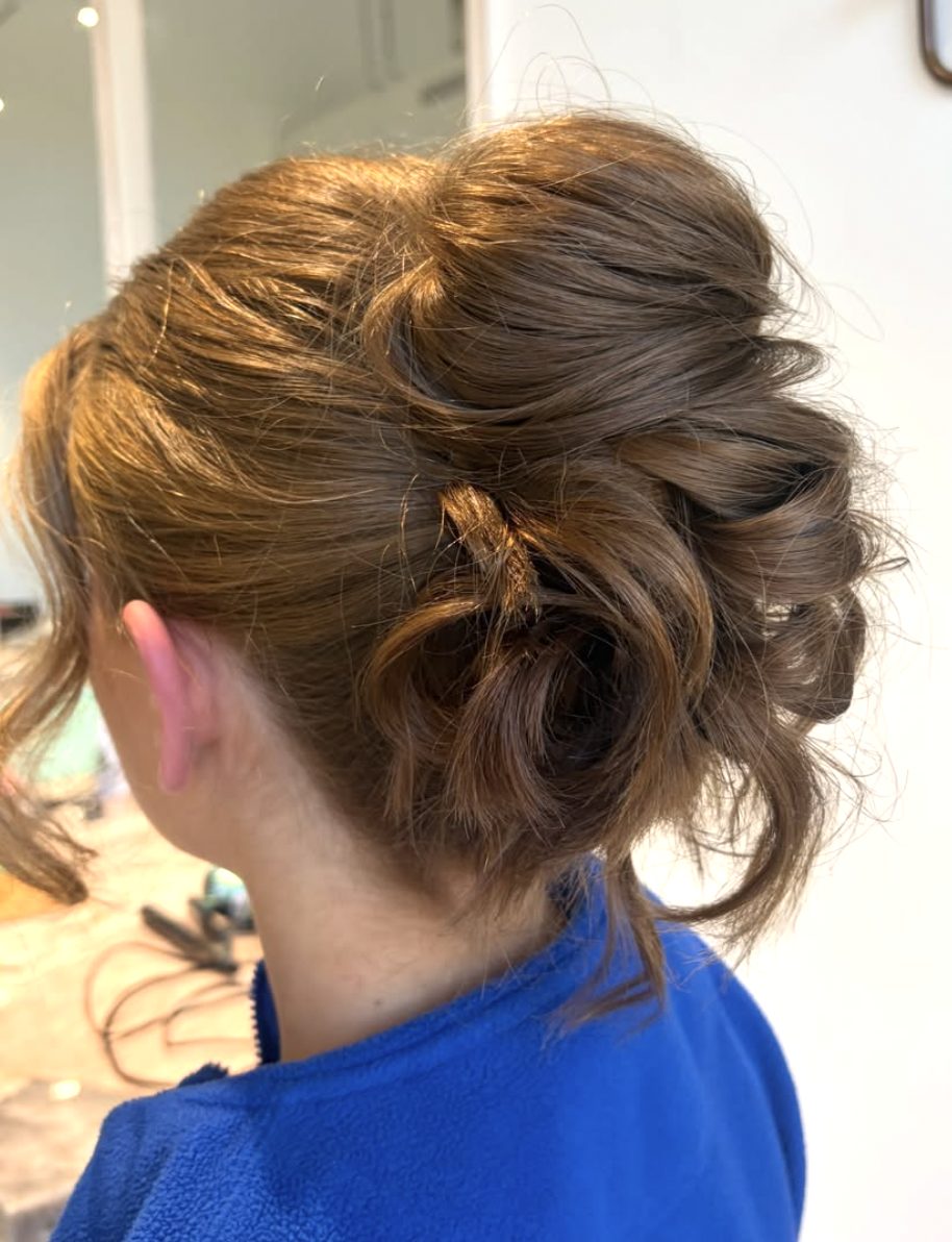 Polished formal hairstyling