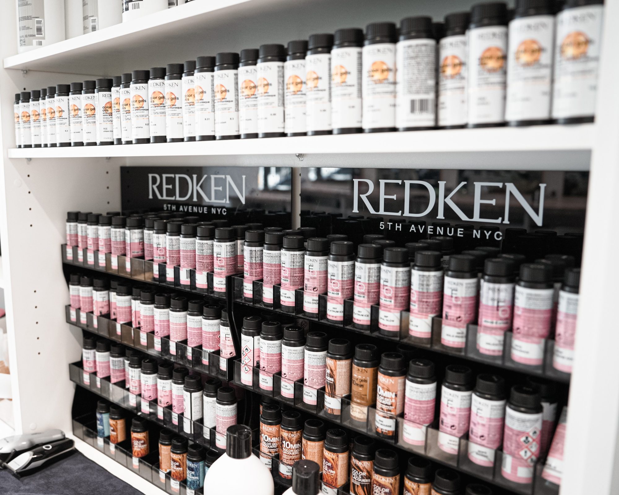Redken colour shelving stocked at Elizabeth & Co.